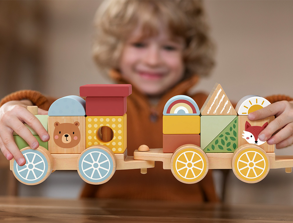 JEU ENFANT IMAGINOVO TRAIN FORMES EMPILABLES AVEC ROUES  BOIS +18 MOIS 38X9,5X7,5 CM