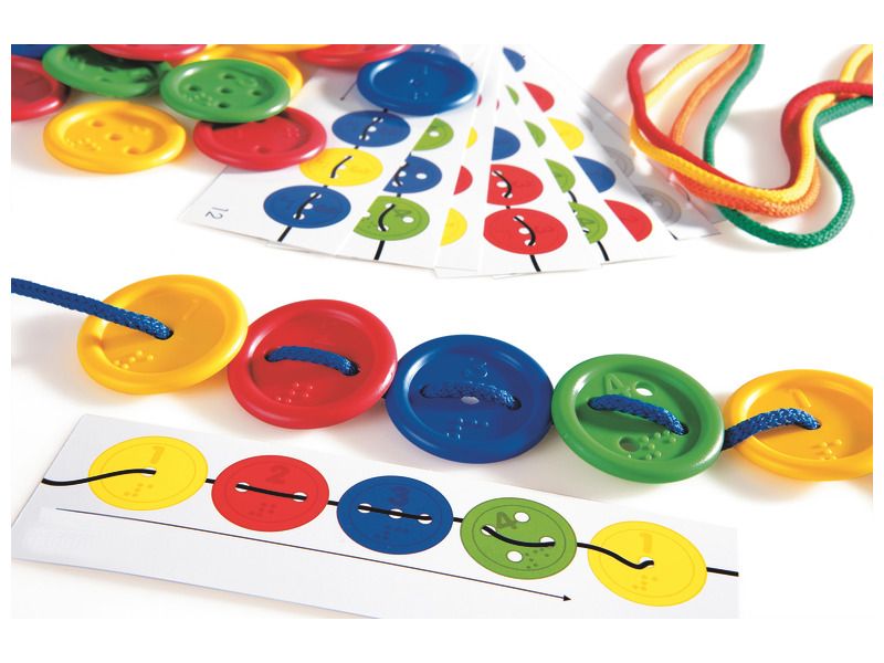 Boutons  lacer -140 boutons, 12 fiches d'exercices et 10 lacets de 93 cm.